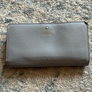 Kate Spade pearl wallet in baby blue